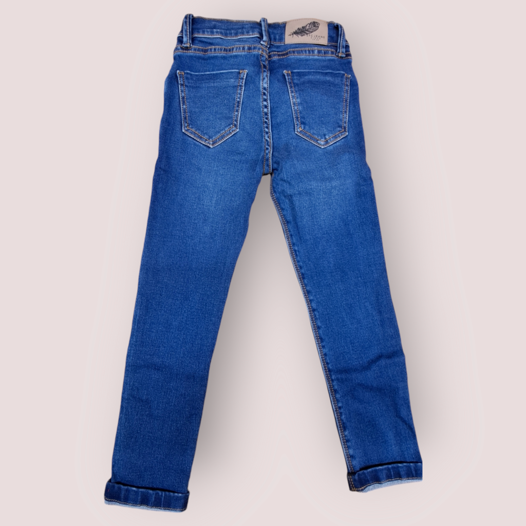 Jeans niña con desgaste sistema ajustable en cintura 